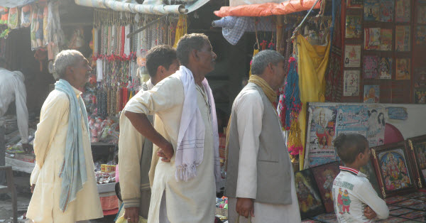A group of villagers listening in rapt attention to a bhajan in Ayodhya
